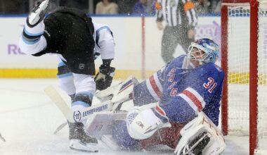 Rangers' Igor Shesterkin leaves ice after collision