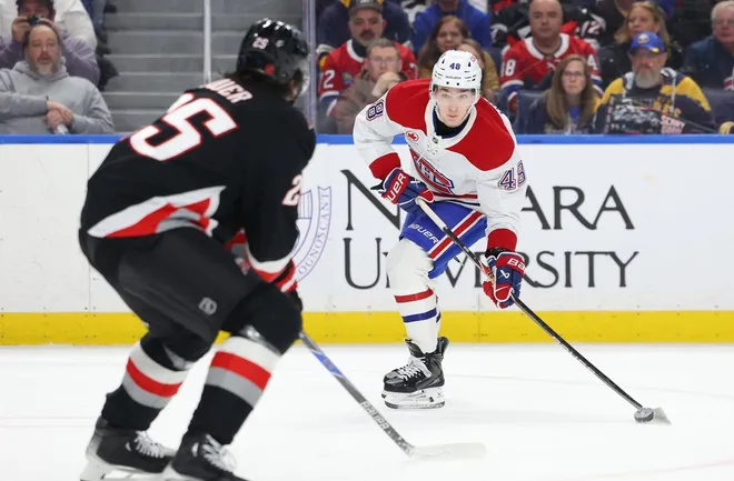 Jan 15, 2026; Buffalo, New York, USA; Montréal Canadiens defenseman Lane Hutson (48) looks to take a shot on goal during the third period against the Buffalo Sabres at KeyBank Center.