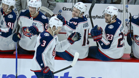 Charlie Coyle had a hat trick, Zach Werenski and Mathieu Olivier had multi-point nights, and Elvis Merzlikins made 22 saves as the Columbus Blue Jackets rolled to a 4-2 win over Chicago.