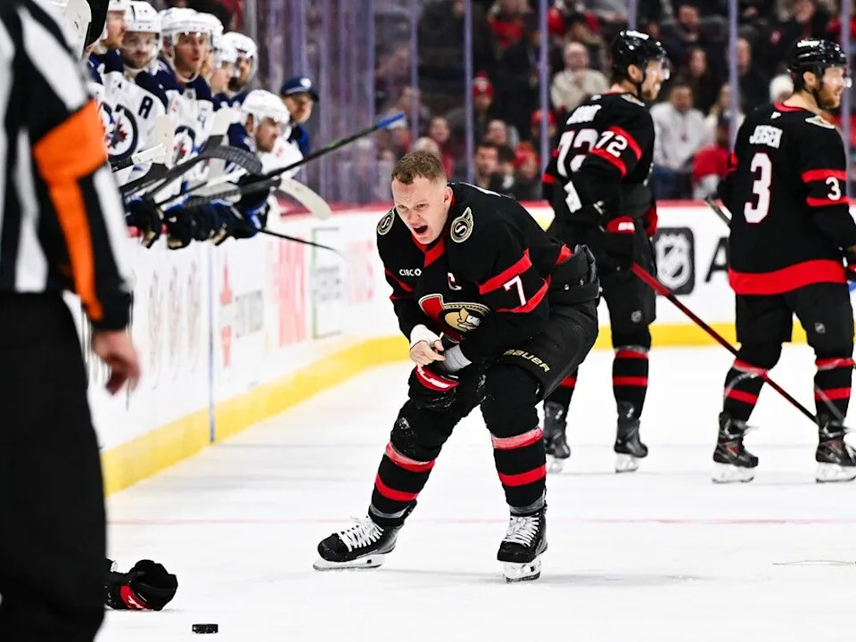  Brady Tkachuk of the Senators reacts angrily after being punched by the Jets’ Logan Stanley in the second period.