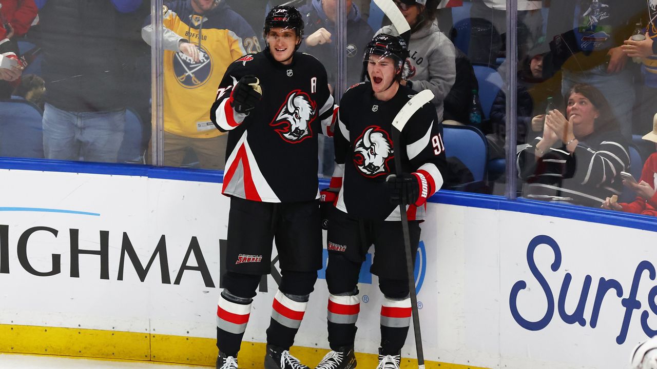 Buffalo Sabres center Tage Thompson (72 celebrates his goal with right wing Josh Doan (91) during the third period of an NHL hockey game against the Montreal Canadiens Thursday, Jan. 15, 2026, in Buffalo, N.Y. (AP Photo/Jeffrey T. Barnes)
