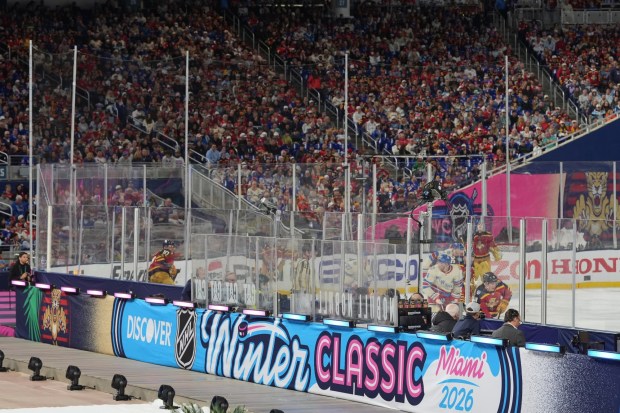 The New York Rangers and Florida Panthers play during the third period of the NHL Winter Classic outdoor hockey game, Friday, Jan. 2, 2026, in Miami. (AP Photo/Rebecca Blackwell)