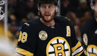 A patch honoring the number retirement of former Boston Bruins captain Zdeno Chara on the jersey of David Pastrnak during the third period of an NHL hockey game against the Seattle Kraken Thursday, Jan. 15, 2026, in Boston. (AP Photo/Winslow Townson)