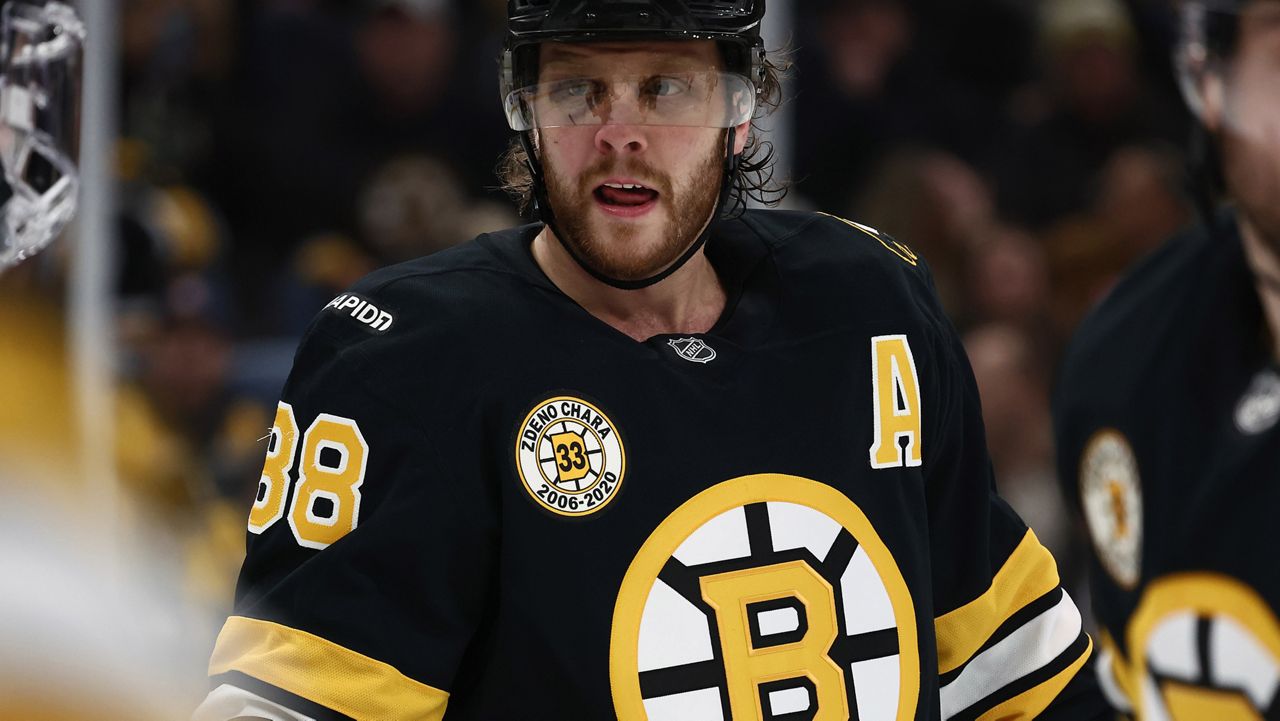 A patch honoring the number retirement of former Boston Bruins captain Zdeno Chara on the jersey of David Pastrnak during the third period of an NHL hockey game against the Seattle Kraken Thursday, Jan. 15, 2026, in Boston. (AP Photo/Winslow Townson)