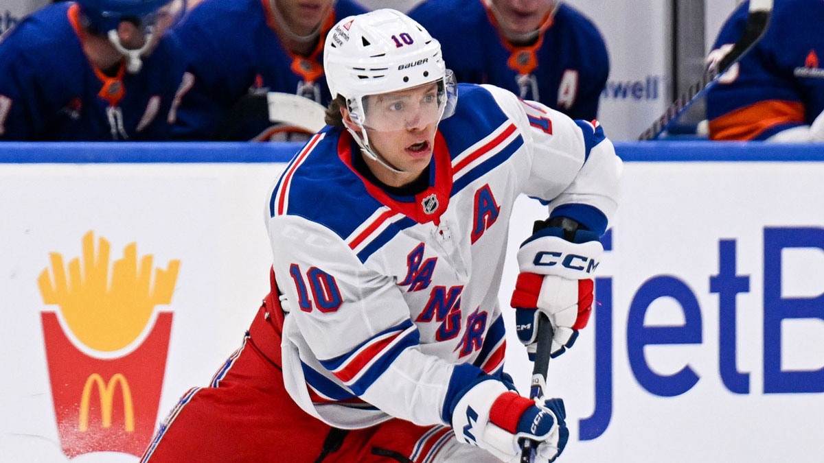 New York Rangers left wing Artemi Panarin (10) skates across the blue against the New York Islanders during the first period at UBS Arena.