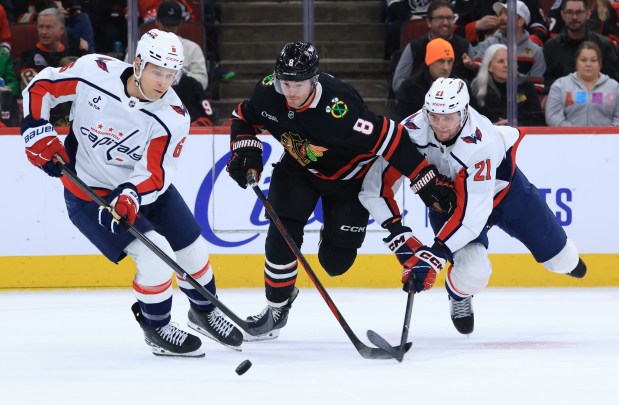 Blackhawks center Ryan Donato (8) chases Capitals defenseman Jakob Chychrun (6) in the first period at the United Center on Jan. 9, 2026, in Chicago. (John J. Kim/Chicago Tribune)