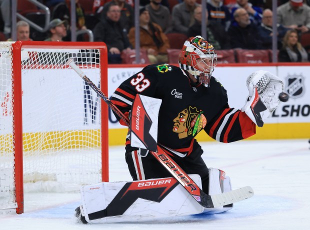 Blackhawks goaltender Drew Commesso stops a shot in the second period against the Capitals at the United Center on Jan. 9, 2026, in Chicago. (John J. Kim/Chicago Tribune)