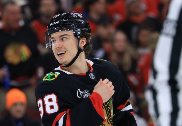 Blackhawks center Connor Bedard smiles after a penalty call on the Capitals in the third period at the United Center on Jan. 9, 2026, in Chicago. (John J. Kim/Chicago Tribune)