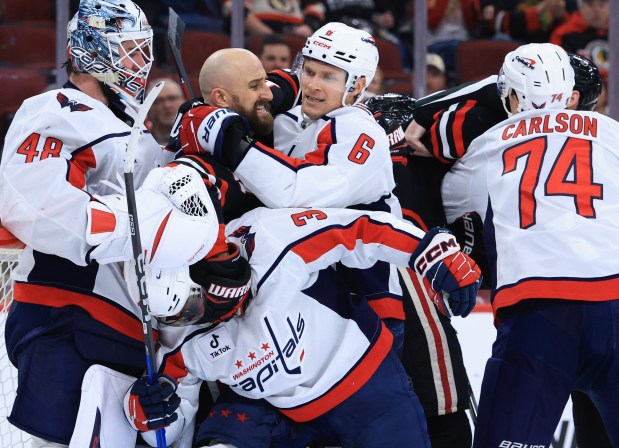 Blackhawks left wing Nick Foligno gets in a scuffle without his helmet in the third period against the Capitals at the United Center on Jan. 9, 2026, in Chicago. (John J. Kim/Chicago Tribune)