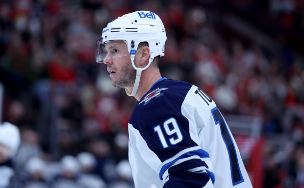 Winnipeg Jets center Jonathan Toews (19) stands on the ice during a break in the action in the second period of a game against the Chicago Blackhawks at the United Center in Chicago on Jan. 19, 2026. (Chris Sweda/Chicago Tribune)