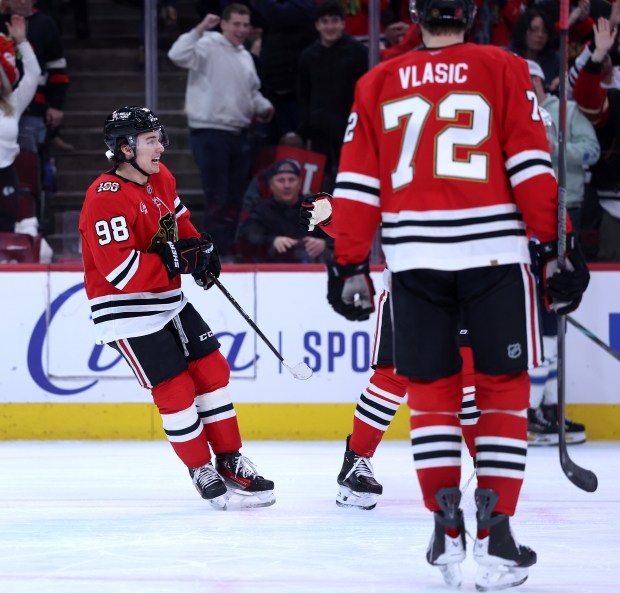 Chicago Blackhawks center Connor Bedard (98) celebrates after scoring an empty-net goal in the third period of a game against the Winnipeg Jets at the United Center in Chicago on Jan. 19, 2026. (Chris Sweda/Chicago Tribune)