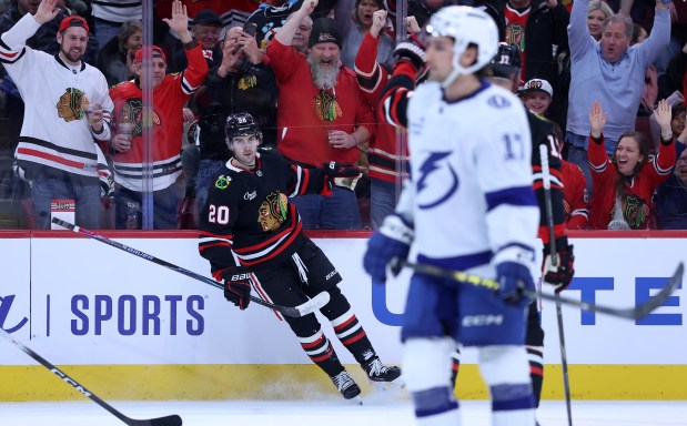 Chicago Blackhawks center Ryan Greene (20) celebrates after scoring a goal in the first period of a game against the Tampa Bay Lightning at the United Center in Chicago on Jan. 23, 2026. (Chris Sweda/Chicago Tribune)