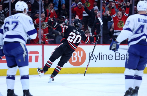 Chicago Blackhawks center Ryan Greene (20) celebrates after scoring a goal in the first period of a game against the Tampa Bay Lightning at the United Center in Chicago on Jan. 23, 2026. (Chris Sweda/Chicago Tribune)