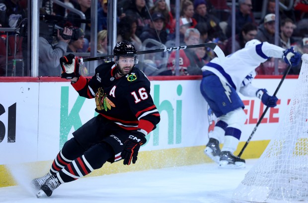 Chicago Blackhawks center Jason Dickinson (16) tries to locate the puck in the first period of a game against the Tampa Bay Lightning at the United Center in Chicago on Jan. 23, 2026. (Chris Sweda/Chicago Tribune)