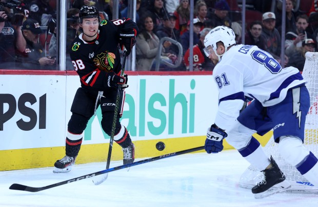 Chicago Blackhawks center Connor Bedard (98) makes a pass in the first period of a game against the Tampa Bay Lightning at the United Center in Chicago on Jan. 23, 2026. (Chris Sweda/Chicago Tribune)