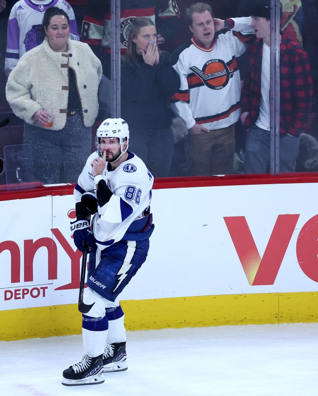 Tampa Bay Lightning right wing Nikita Kucherov (86) gestures after scoring on Chicago Blackhawks goaltender Arvid Soderblom during the shootout of a game at the United Center in Chicago on Jan. 23, 2026. (Chris Sweda/Chicago Tribune)