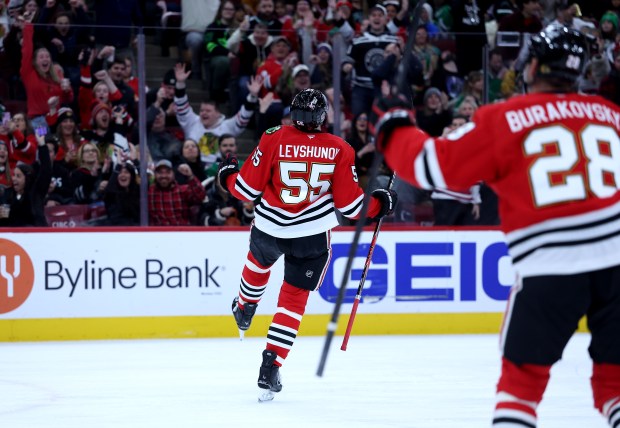 Chicago Blackhawks defenseman Artyom Levshunov (55) celebrates after scoring a goal in the first period of a game against the Dallas Stars at the United Center in Chicago on Jan. 1, 2026. (Chris Sweda/Chicago Tribune)