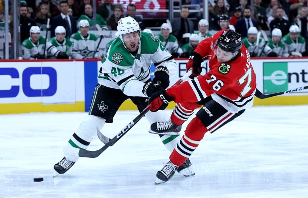 Chicago Blackhawks left wing Nick Lardis (76) takes a shot on goal in the first period of a game against the Dallas Stars at the United Center in Chicago on Jan. 1, 2026. (Chris Sweda/Chicago Tribune)