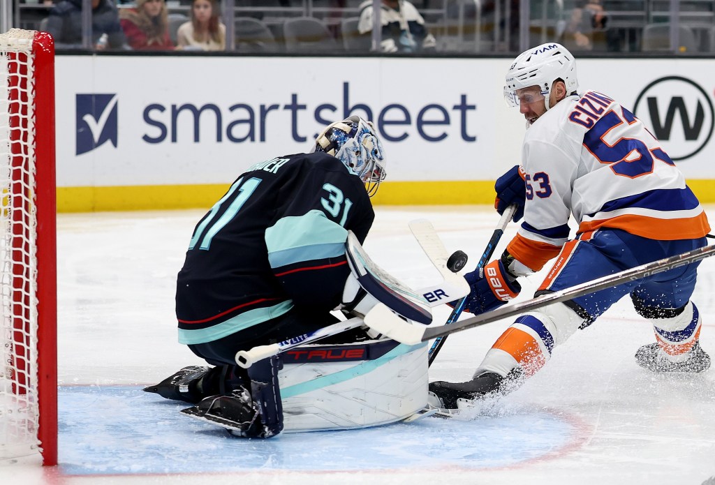 Casey Cizikas, part of the Islanders' revamped fourth line, puts a shot on goal that Philipp Grubauer saves during the Islanders' 4-1 loss to the Sabres on Jan. 21, 2026 in Seattle. 