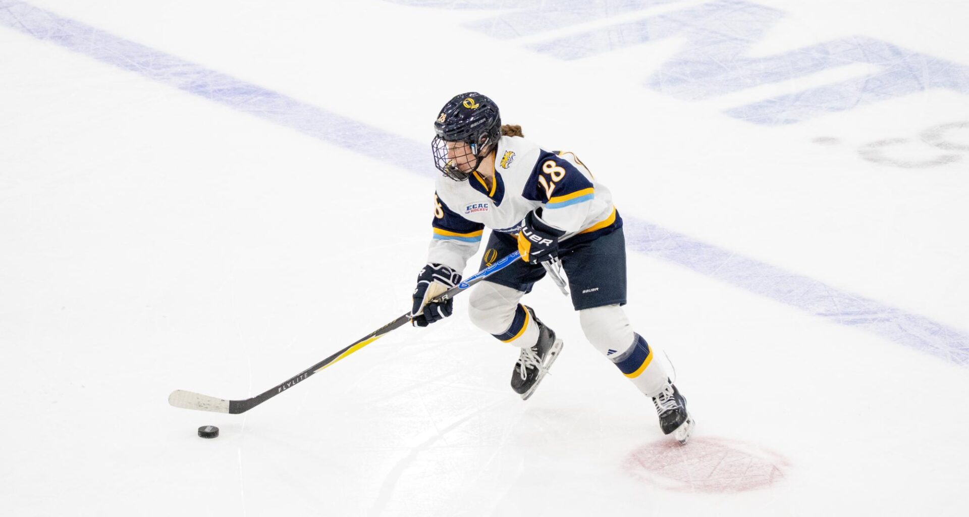 First hat trick by a defenseman in fifteen years powers women’s hockey to 5-1 win