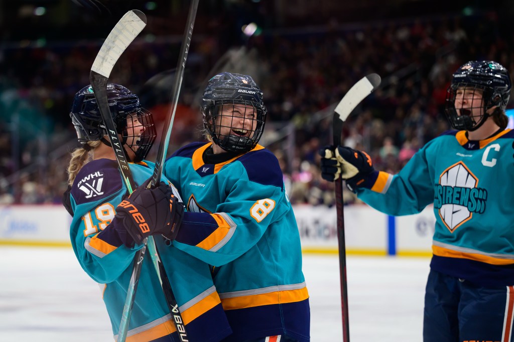New York Sirens celebrate goal during the PWHL game between the New York Sirens and the Montréal Victoire January 18 2026, at Capital One Arena in Washington DC. 