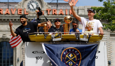 Denver Nuggets players and owner celebrate during championship parade