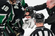 Dallas Stars left wing Jamie Benn leaves the ice after being injured during the third period...