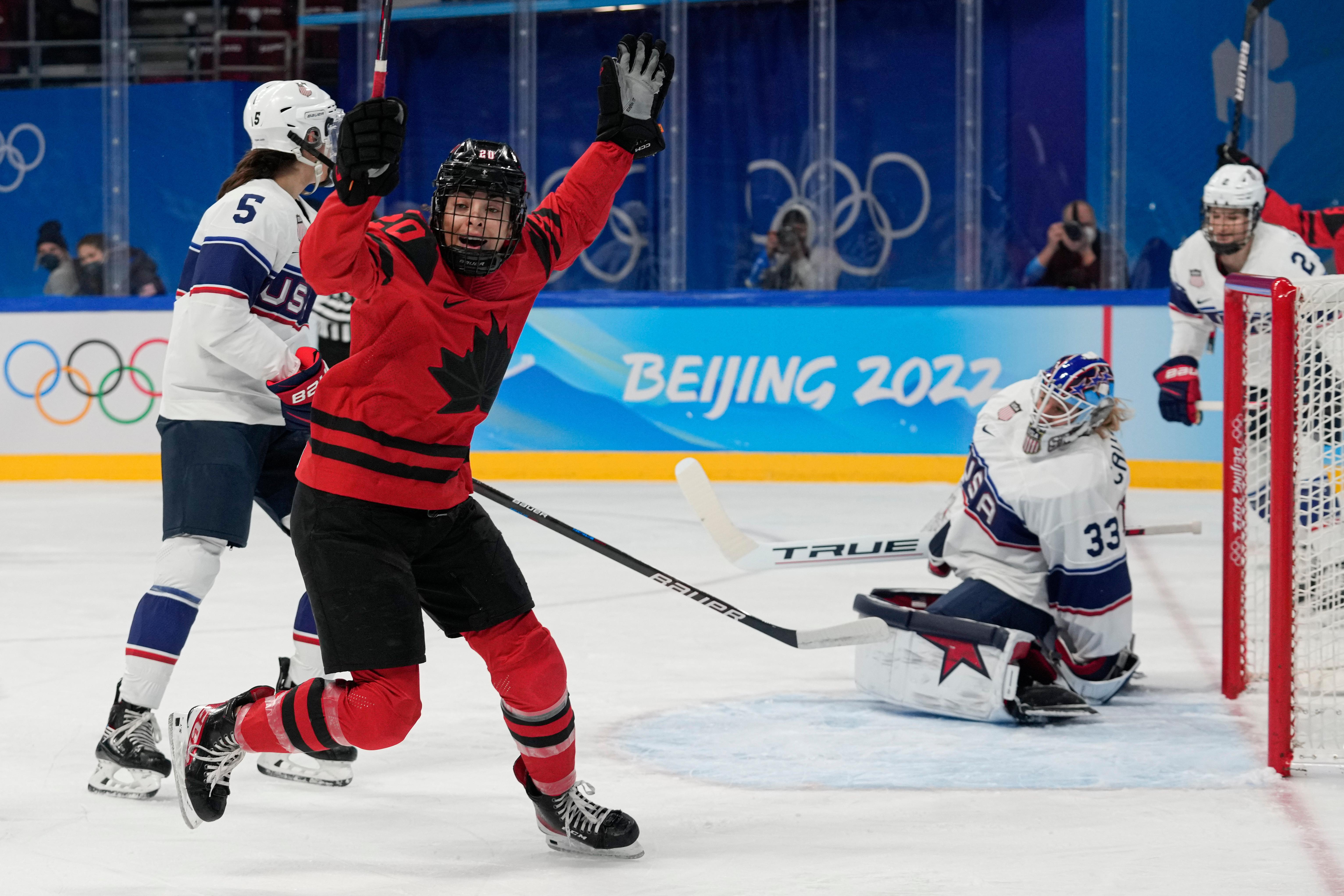 FILE – Canada’s Sarah Nurse (20) celebrates a goal during...