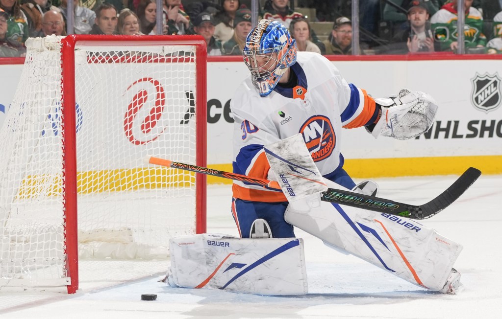 Ilya Sorokin makes one of his 33 saves during the Islanders' 4-3 overtime win over the Wild on Jan. 10, 2026 in St. Paul, Minn.