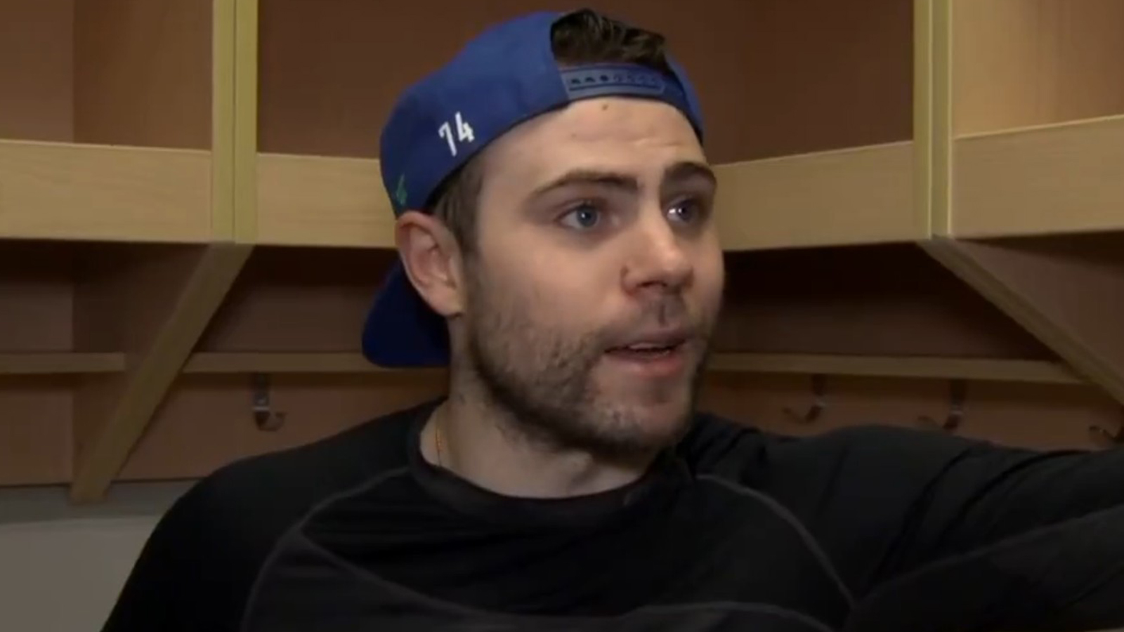 Jake DeBrusk being interviewed