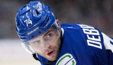 Jake DeBrusk #74 skating for the Vancouver Canucks