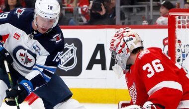 Gibson makes 24 saves as surging Red Wings beat slumping Jets, 2-1