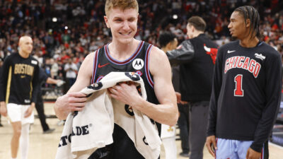 Jan 24, 2026; Chicago, Illinois, USA; Chicago Bulls guard Kevin Huerter (13) celebrates after scoring a game winning three-pointer against the Boston Celtics at United Center.