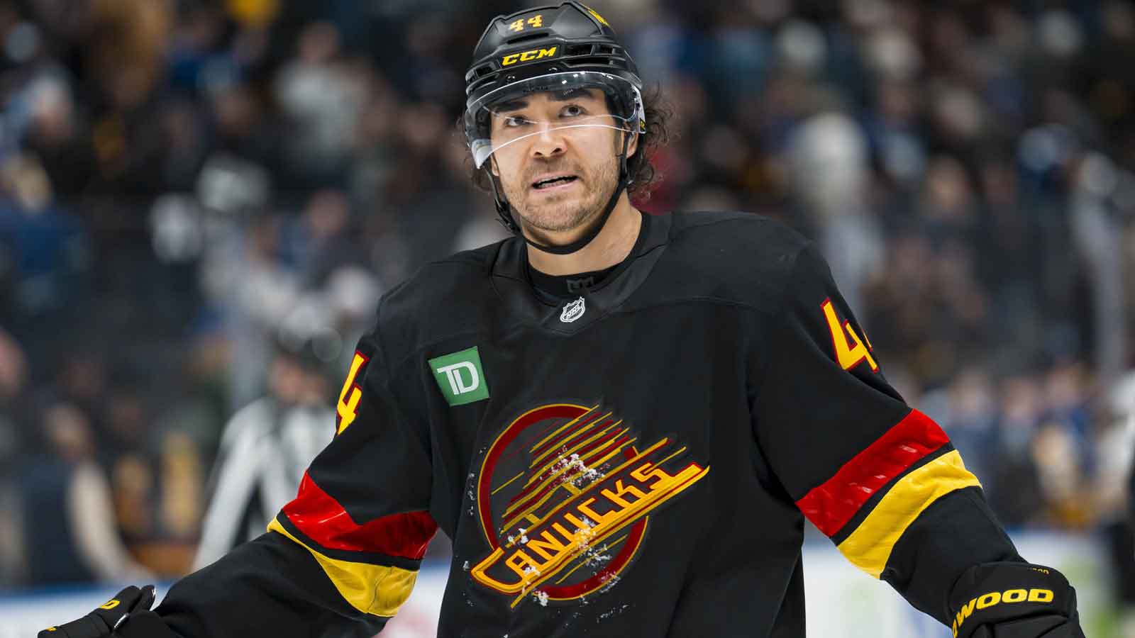 Vancouver Canucks forward Kiefer Sherwood (44) reacts to the loss against the Boston Bruins in overtime at Rogers Arena.