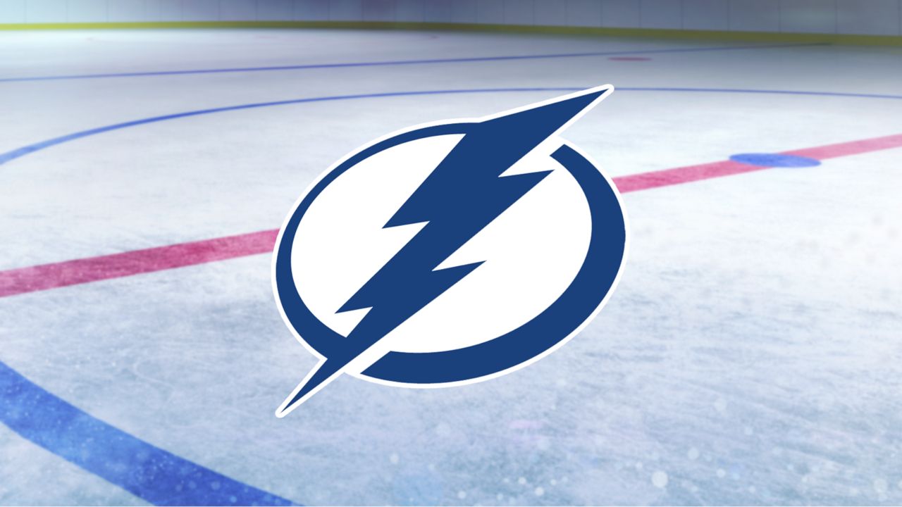 Tampa Bay Lightning primary logo on a background showing the center ice of a hockey rink.