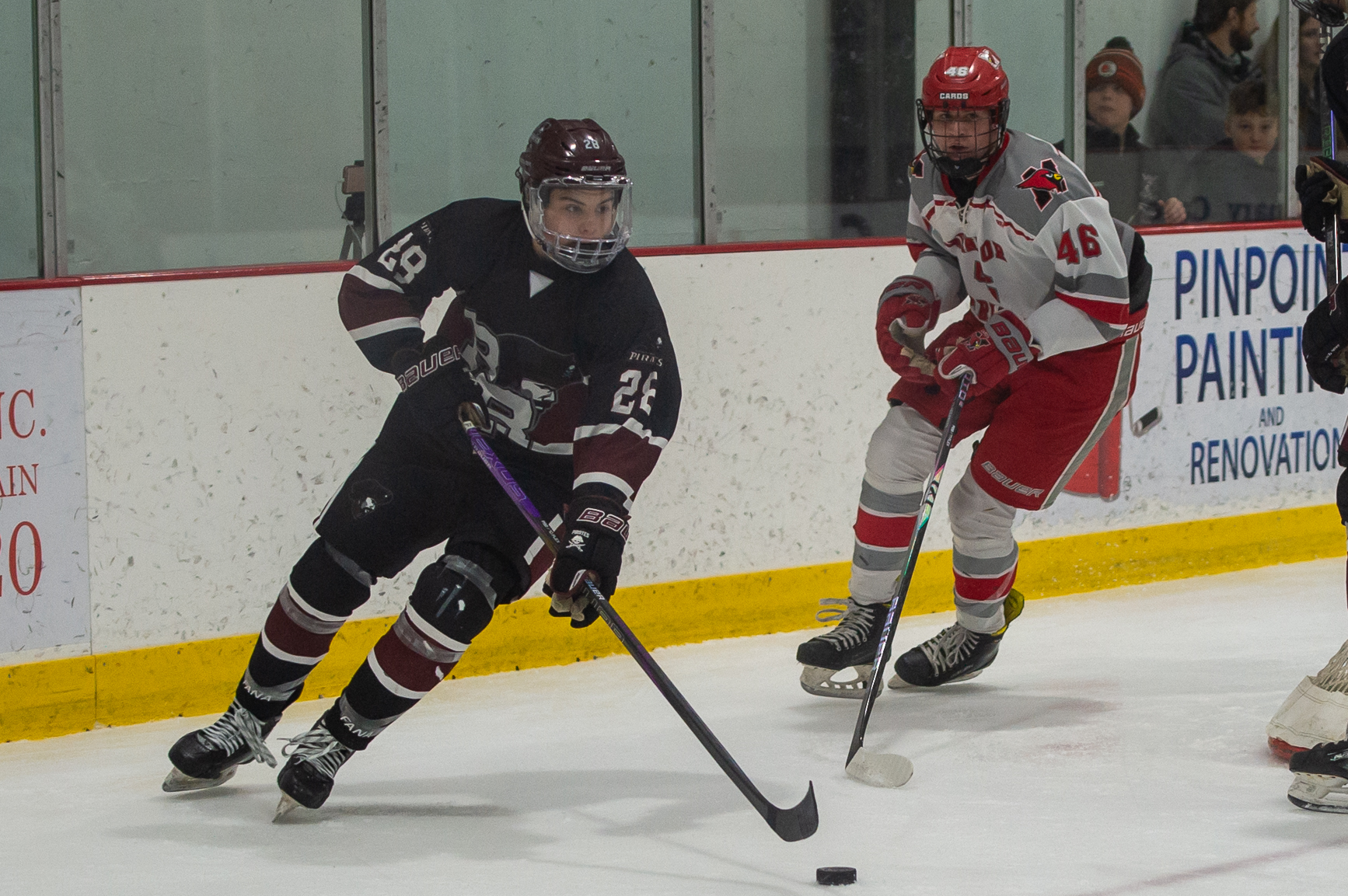 Rocky River's Luca Lamastra takes the puck behind the goal...