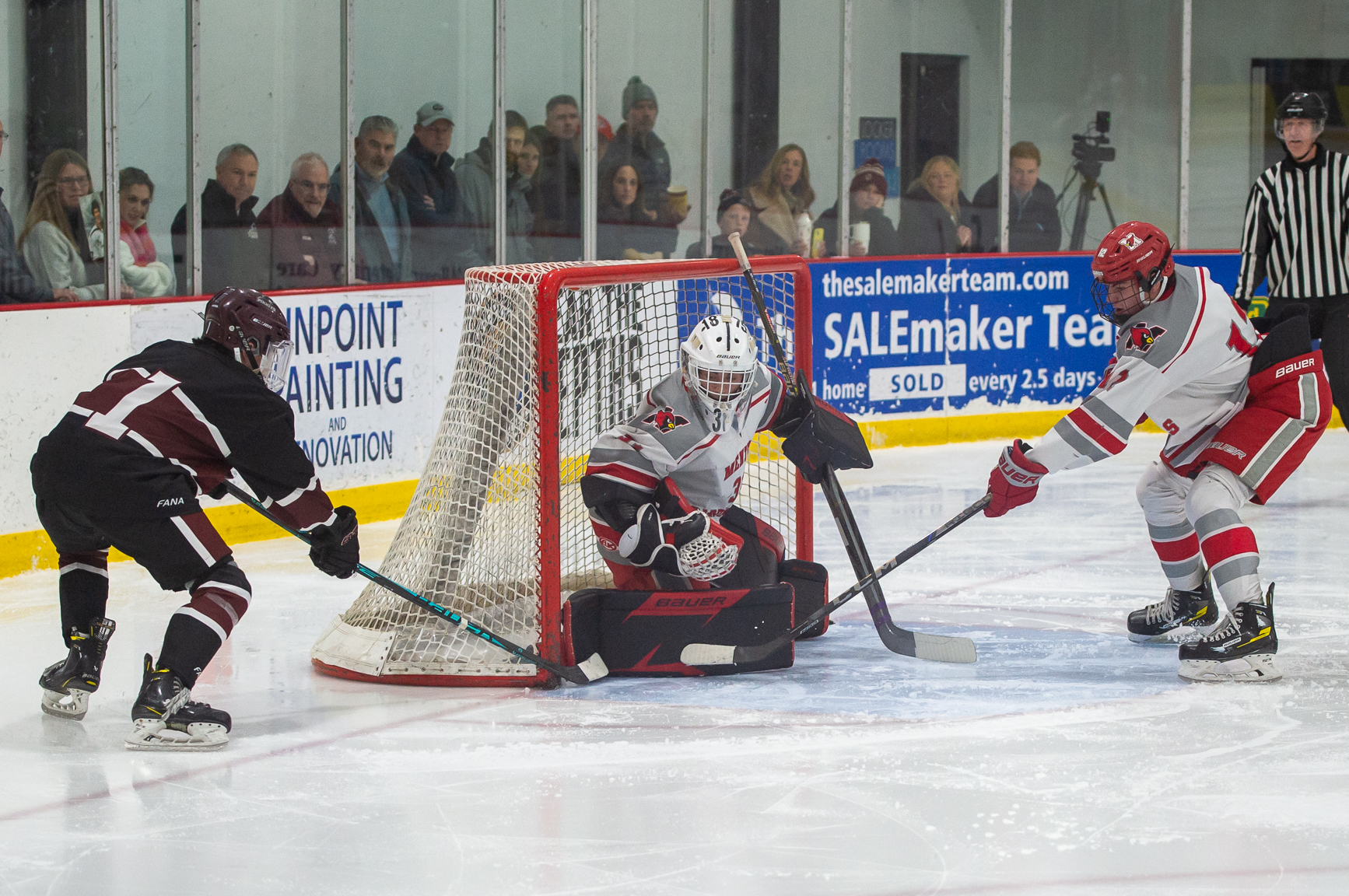 Rocky River's Jackson Rood scores against Mentor on Jan. 23....