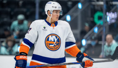 New Jersey Devils defenseman Dougie Hamilton (7) passes the puck while defended by San Jose Sharks defenseman Mario Ferraro (38) in the first period at SAP Center at San Jose.