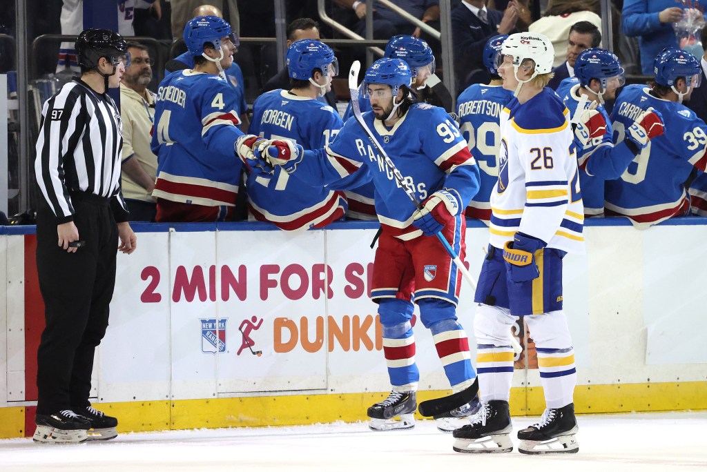 Mika Zibanejad celebrates with teammates after scoring a second-period goal during the Rangers' loss to the Sabres.