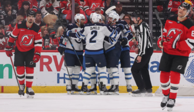 Jonas Siegenthaler (71 and Johnathan Kovacevic (8) react following a Winnipeg Jets goal against the New Jersey Devils on Tuesday night at the Prudential Center.