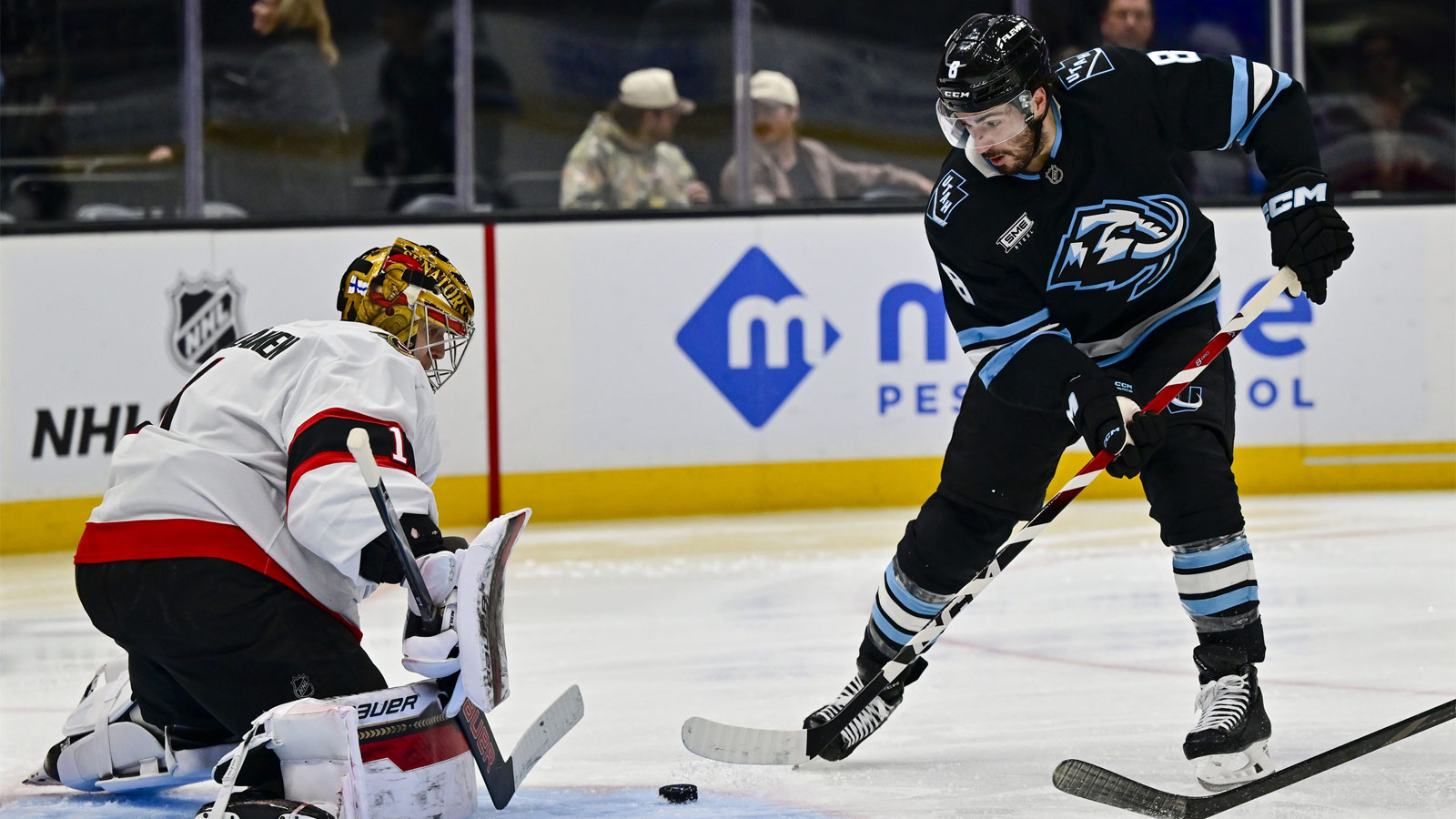  Utah Mammoth center Nick Schmaltz (8) looks to score against Ottawa Senators goalie Leevi Merilainen (1) during second period at Delta Center. 