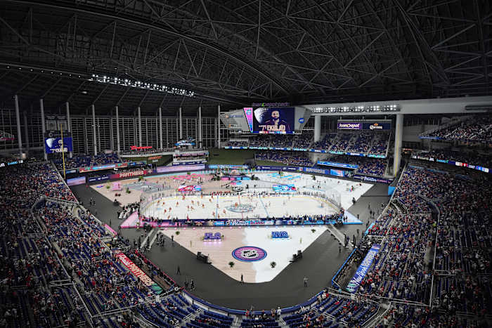 Panthers and Rangers play outdoor hockey game in Miami, replete with snow and fire