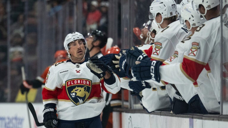 Florida Panthers left wing Brad Marchand (63) celebrates his goal with the bench during the first period of an NHL hockey game against the Anaheim Ducks, Tuesday, Nov. 4, 2025, in Anaheim, Calif.