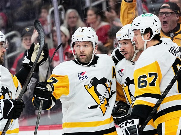 Rust, Chinakhov send streaking Penguins past Red Wings 4-1