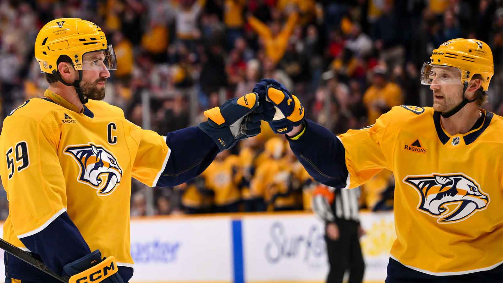 Nashville Predators defenseman Roman Josi (59) celebrates his goal with center Steven Stamkos (91) against the Washington Capitals during the third period at Bridgestone Arena.
