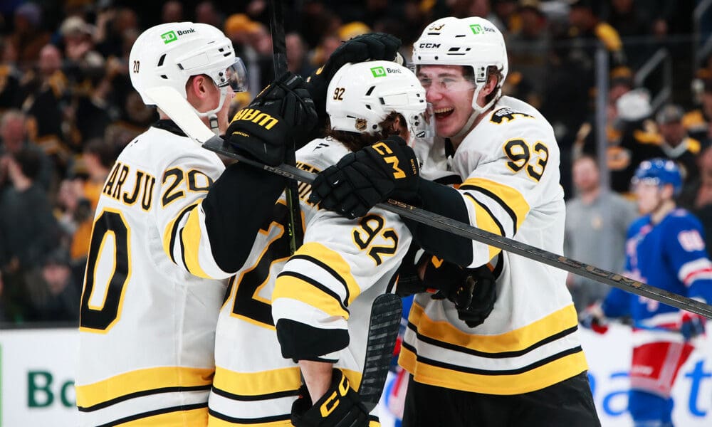 BOSTON, MA - JANUARY 10: Fraser Minten #93 of the Boston Bruins celebrates Marat Khusnutdinov #92 of the Boston Bruins after scoring his hat-trick goal during the game between the Boston Bruins and the New York Rangers on January 10, 2026, at TD Garden in Boston, MA. (Photo by Summer Lamont/Icon Sportswire)
