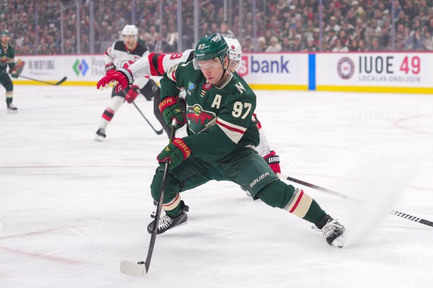 Kirill Kaprizov handles the puck