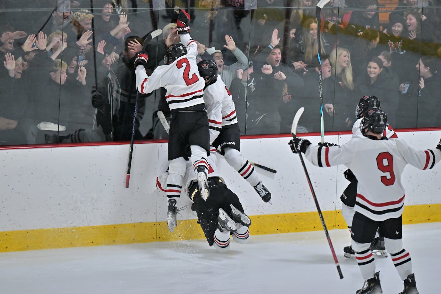 Winchester players and fans support Axel Osborn's second-period goal.