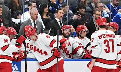 Carolina Hurricanes head Coach Rod Brind'Amour talks to his players during 2023 game.