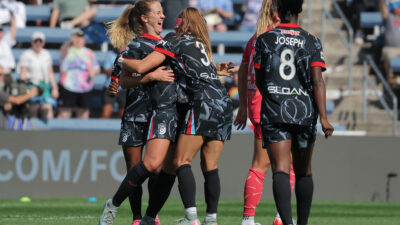 Sep 14, 2025; Bridgeview, Illinois, USA; Chicago Stars FC midfielder Bea Franklin (20) celebrates her goal with teammates during the first half of a match against the Portland Thorns FC at SeatGeek Stadium.